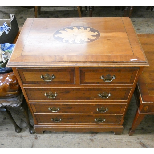 62 - A Georgian style inlaid yew wood chest of three long and three short drawers with brass handles. 2' ... 