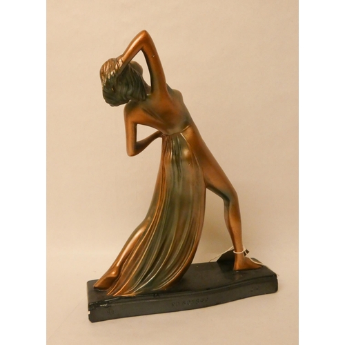 200 - An Art Deco bronze effect plaster model of a dancing lady. Registration number on reverse