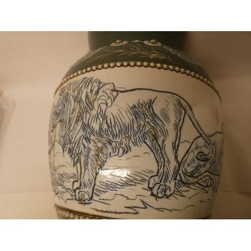 206 - A Doulton Lambeth stoneware vase by Hannah Barlow, the large vase sgraffito decorated with lions wit... 