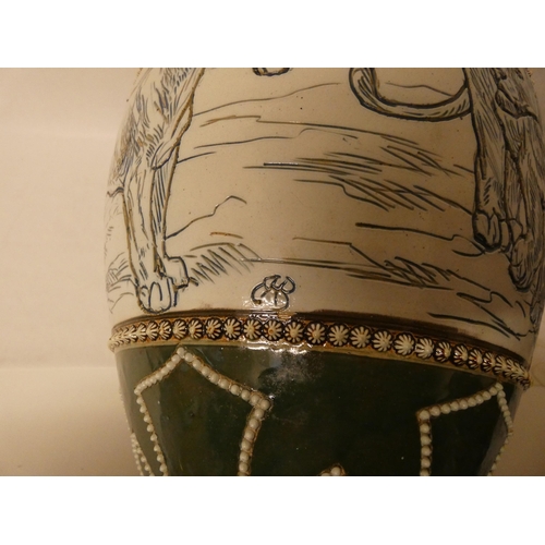 206 - A Doulton Lambeth stoneware vase by Hannah Barlow, the large vase sgraffito decorated with lions wit... 