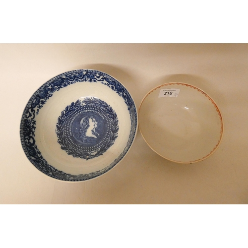 218 - A blue and white transfer printed bowl with motto - 'A king revered, adored, beloved'  and a famille... 