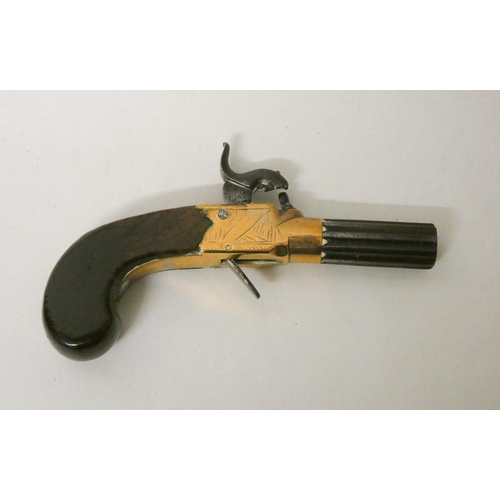 222 - A 19th century percussion cap muff pistol with octagonal barrel