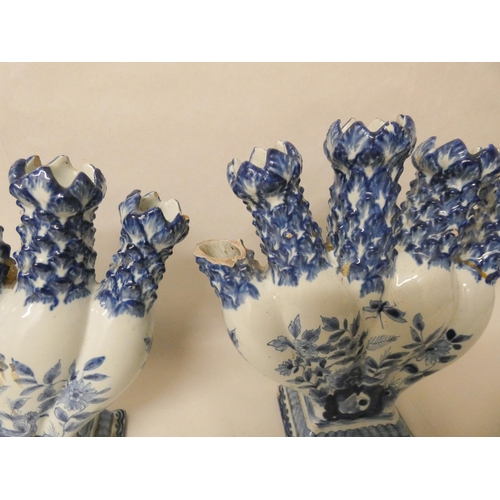 232 - A pair of antique Delft blue and white tulip bough pots