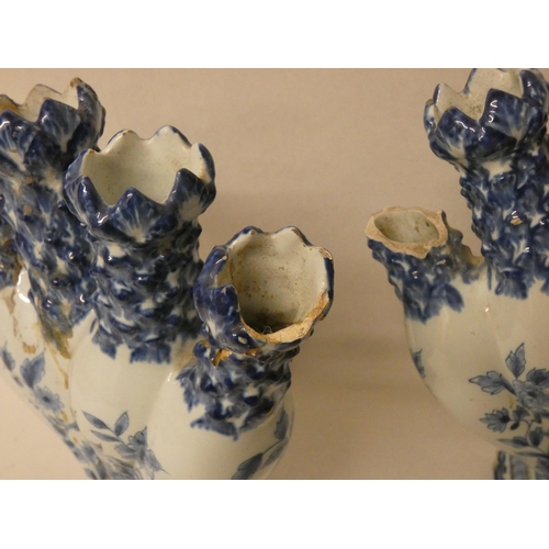 232 - A pair of antique Delft blue and white tulip bough pots