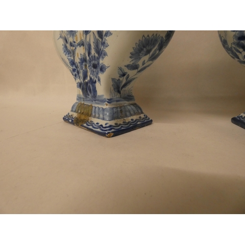 232 - A pair of antique Delft blue and white tulip bough pots