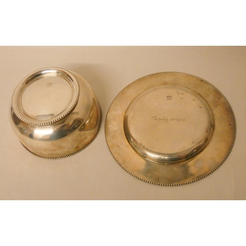 500 - An American sterling silver christening bowl and matching plate, both with inscription October 10th ... 