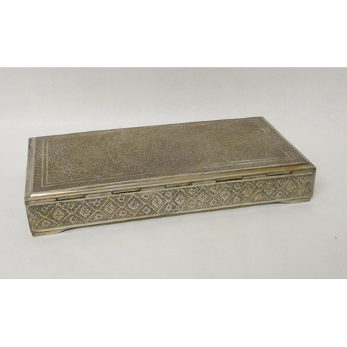 502 - A Persian white metal table top rectangular cigarette box with hinged lid with engraved decoration. ... 