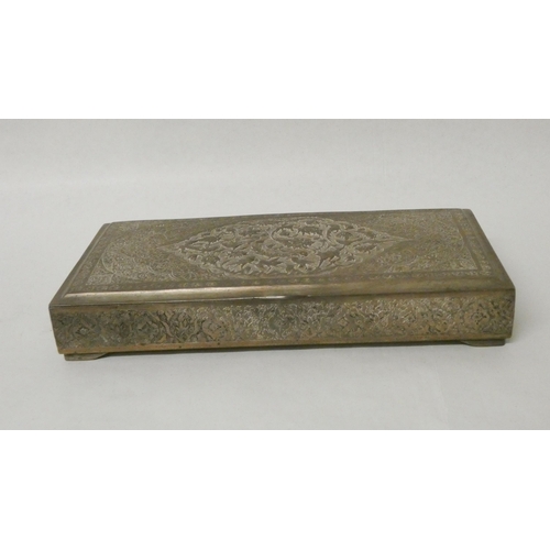 503 - A Persian white metal table top rectangular cigarette box with hinged lid with engraved decoration. ... 