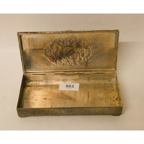 503 - A Persian white metal table top rectangular cigarette box with hinged lid with engraved decoration. ... 