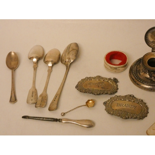 523 - Two silver decanter labels, inkwell, bottle collar and various small silver spoons etc