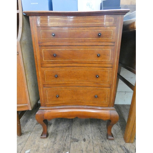 113 - A inlaid mahogany concave front, four drawer music cabinet on cabriole style feet. 22