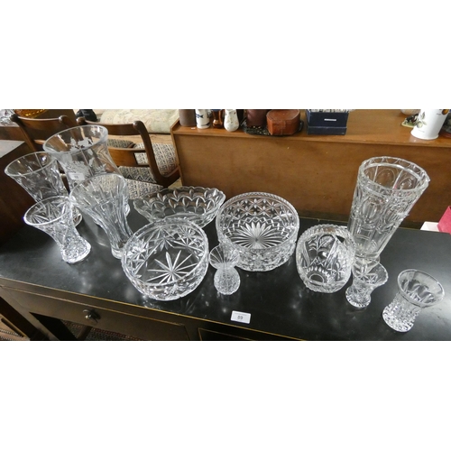 88 - A large collection of assorted crystal glass vases, fruit bowls etc