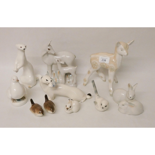 238 - A collection of ten Lomonosov USSR porcelain animal figurines to include rabbits, a standing stoat, ... 