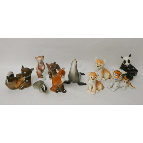 239 - A collection of ten Lomonosov USSR porcelain animal figurines to include a panda, a fox, a bear etc