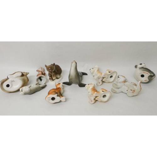 239 - A collection of ten Lomonosov USSR porcelain animal figurines to include a panda, a fox, a bear etc