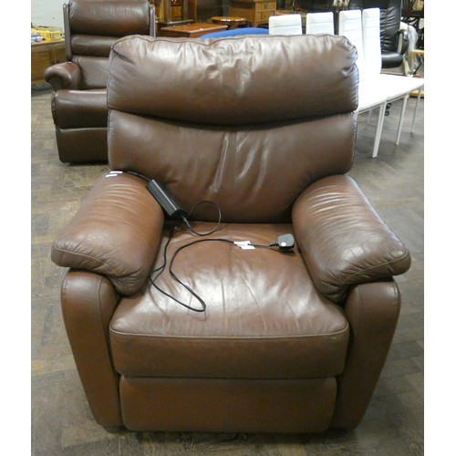 156 - An electric reclining easy chair in brown leather