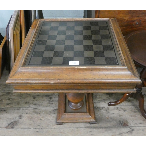 138 - A chess top occasional table on pillar base together with a set of chess pieces