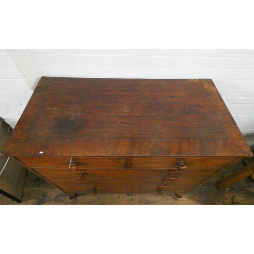 140 - A Victorian mahogany chest of three long and two short drawers with bun handles standing on bracket ... 