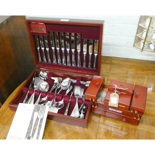 142 - An as new canteen of Arthur Price plated cutlery and a miniature louver sewing box