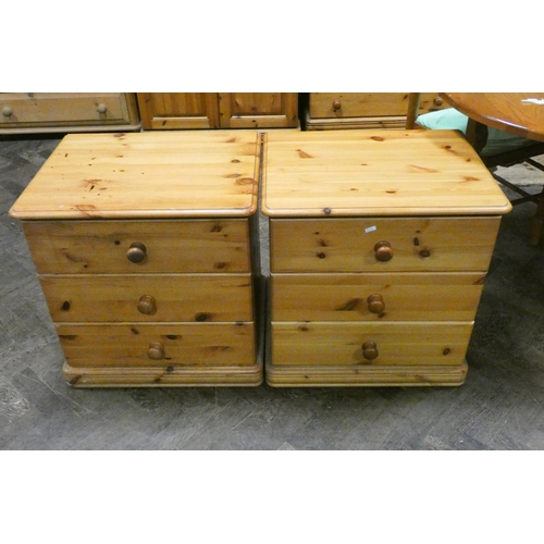 313 - A pair of modern wide pine bedside chests