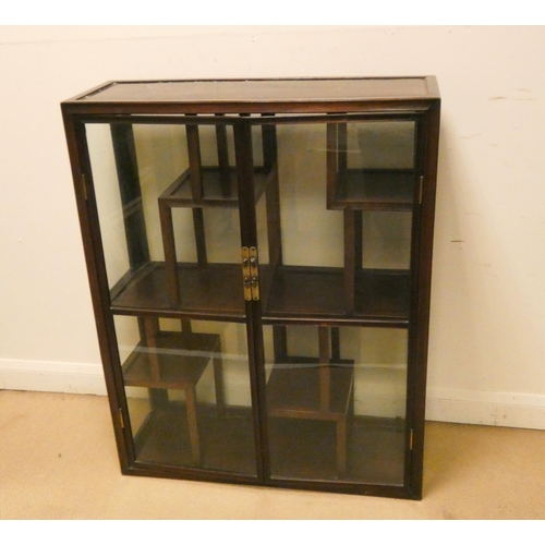 349 - A Chinese hardwood fully  glazed two door display cabinet, with an arrangement of shelves, 36