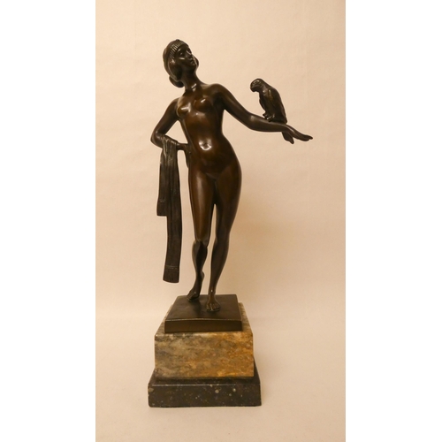 251 - Otto Schmidt-Hofer (German, 1873–1925): A brown patinated Art Deco bronze figure of a female nude wi... 