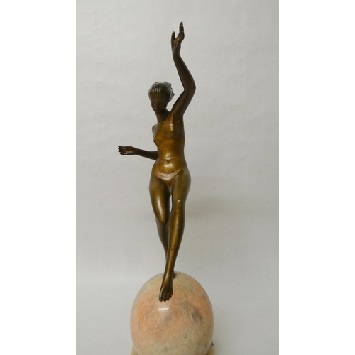 252 - Marcel-Andre Bouraine - An Art Deco French bronze figurine depicting a stylish dancer balancing atop... 