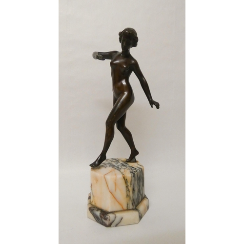 253 - Schumacher Foundry Austrian Art Deco bronze figure of a female nude, the octagonal marble base inset... 