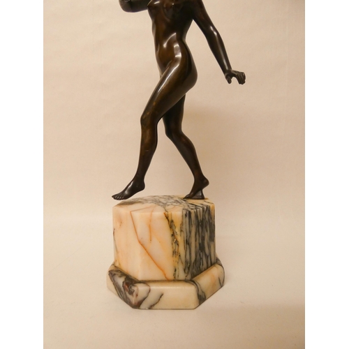 253 - Schumacher Foundry Austrian Art Deco bronze figure of a female nude, the octagonal marble base inset... 