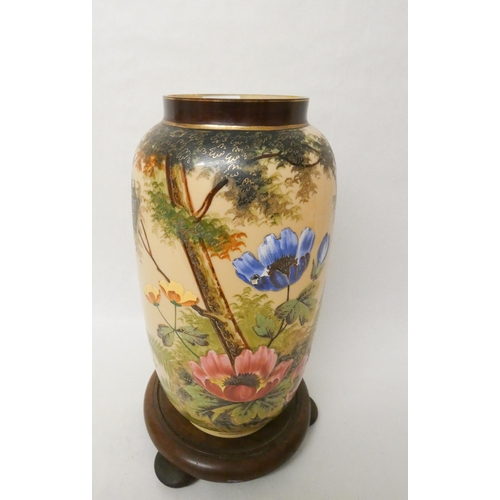 378 - A late 19th century enamelled glass vase painted with poppies on a wooden base. Vase height 34cm tal... 