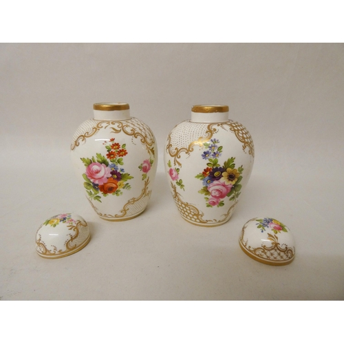 247 - A pair of late 19th century/early 20th century gilt and floral decorated ginger jars in the style of... 