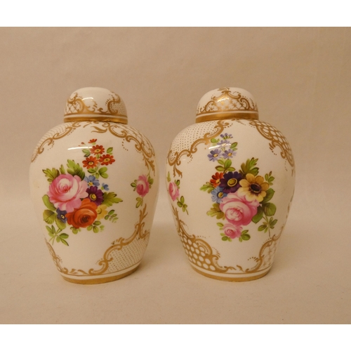 247 - A pair of late 19th century/early 20th century gilt and floral decorated ginger jars in the style of... 