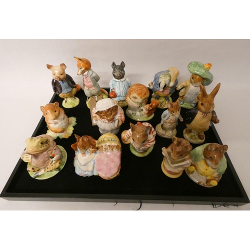 290 - A collection of fifteen Beswick Beatrix Potter figurines, nine with gold printed marks