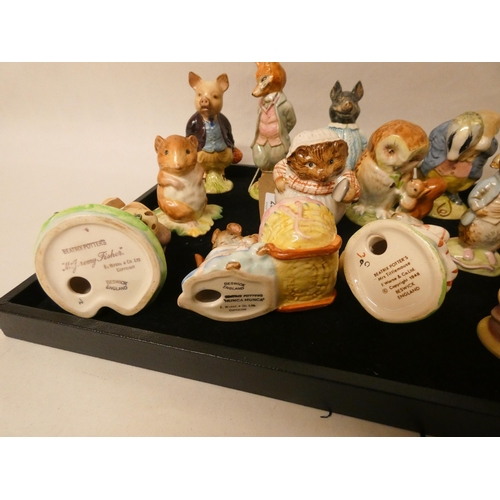 290 - A collection of fifteen Beswick Beatrix Potter figurines, nine with gold printed marks