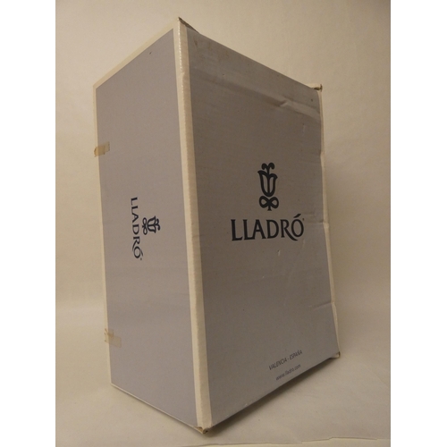 293 - A Lladro - On My Way Home  - large figurine of a young lady with suitcase, with box