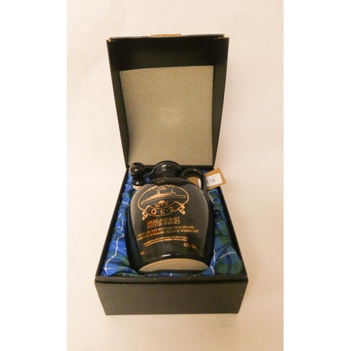 376 - A bottle of commemorative QE2 Highland Malt Scotch Whiskey by Morris and Bowmore. Still sealed with ... 