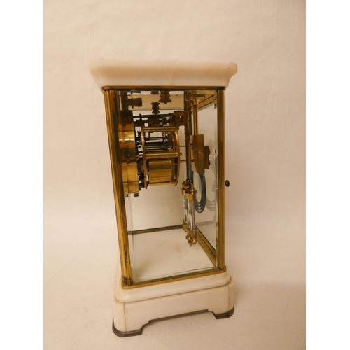 377 - A late 19th century four glass mantel clock with mercury compensating pendulum and keys. 24cm tall