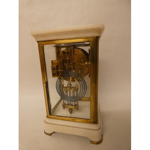 377 - A late 19th century four glass mantel clock with mercury compensating pendulum and keys. 24cm tall