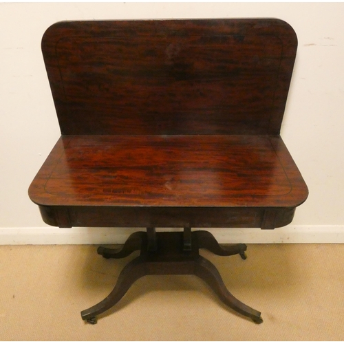 379 - A Victorian mahogany and line inlaid fold over top card table on a centre platform and pillar base