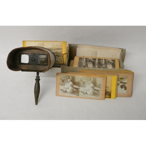 381 - A vintage stereoscope and a collection of stereoscopic cards