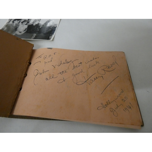 383 - An interesting autograph book containing autographs from Charlie Chaplin, Betty Grable, Edward G Rob... 