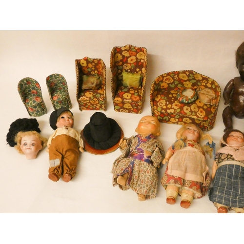 384 - A collection of vintage dolls and fabric covered dolls house furniture