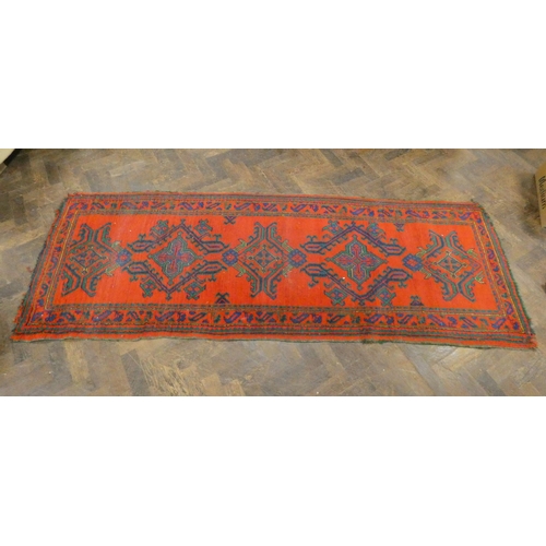 398 - A red Turkish carpet runner 98