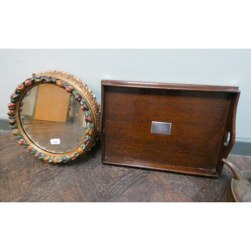 416 - A gilt and fruit decorated circular wall mirror together with an oak two handled tea tray with silve... 