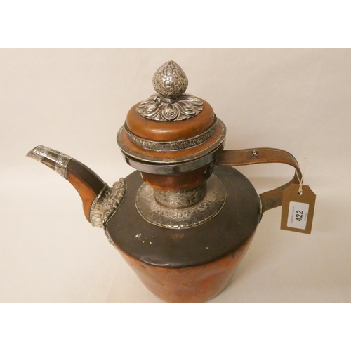 422 - A 19th century Tibetan silver mounted copper ceremonial coffee pot with lotus flower finial