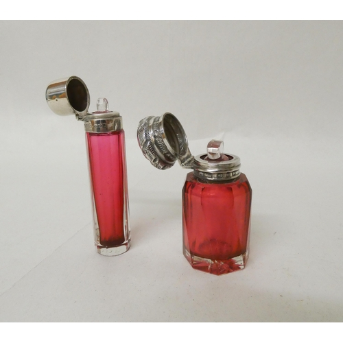 493 - A Victorian cranberry glass scent bottle with hinged hallmarked silver lid and glass stopper 6.5cm t... 