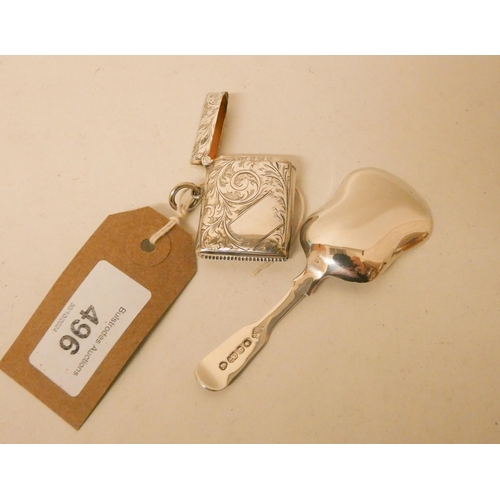 496 - A Victorian silver caddy spoon, hallmarked London 1840 together with an Edwardian silver vesper case... 