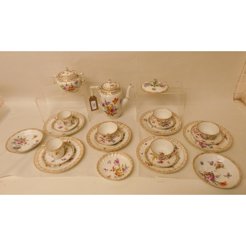 300 - A Dresden gilt and floral decorated tea and coffee service