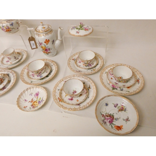 300 - A Dresden gilt and floral decorated tea and coffee service