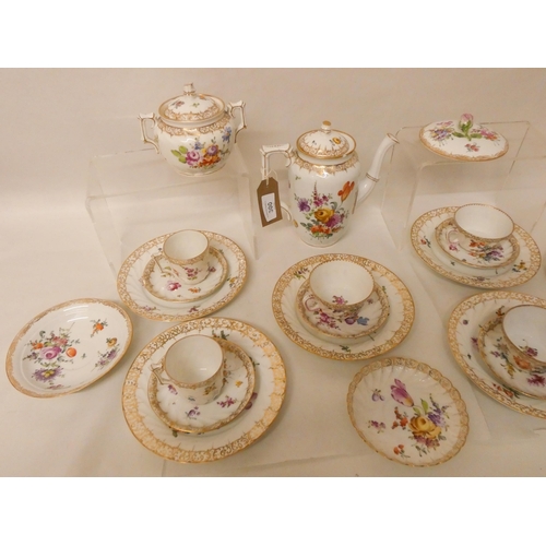 300 - A Dresden gilt and floral decorated tea and coffee service